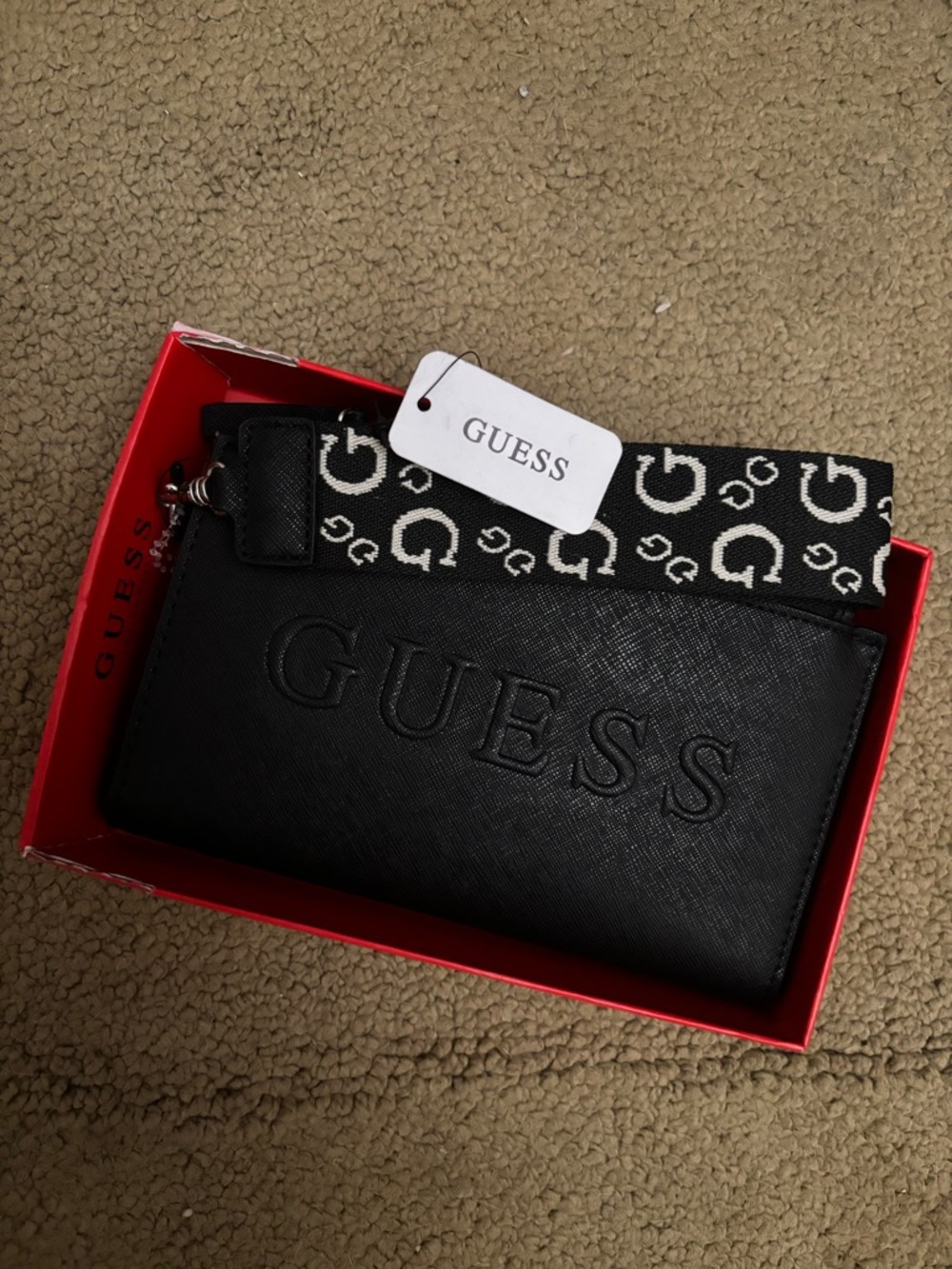 GUESS Black Embossed Logo Wristlet with Black & White Monogram Strap